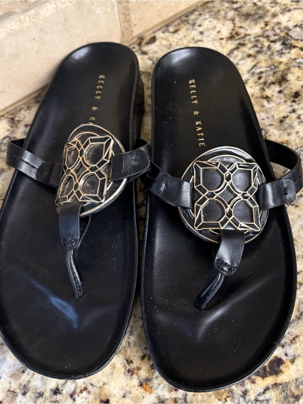 Kelly & Katie Black Leather Thong Sandals with Gold Medallion